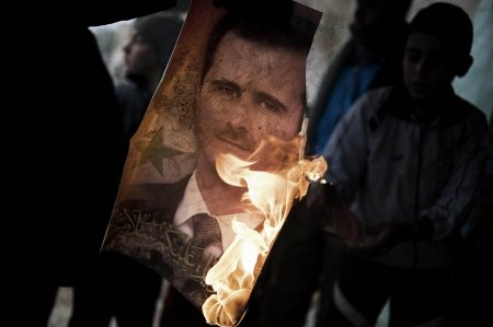 Siria foto Bashar incendiada AFP