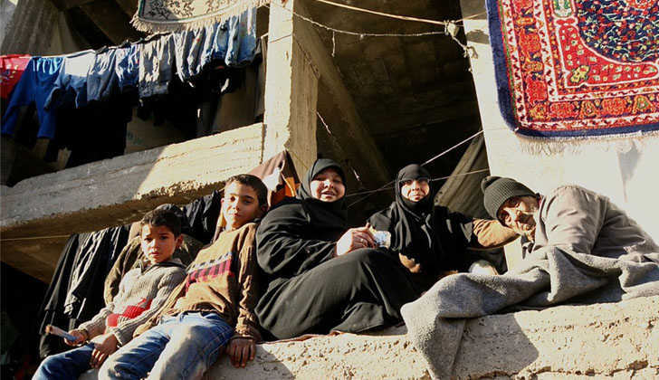 Residentes en un campo de refugiados en Alepo, en Siria. Foto: OCHA/Josephine Guerrero. 