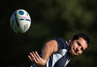 Uruguay's wing Francisco Bulanti passes the ball during a team training session in Northampton, central England, on September 30, 2015, during the 2015 Rugby World Cup 2015.      AFP PHOTO / BERTRAND LANGLOIS RESTRICTED TO EDITORIAL USE        (Photo credit should read BERTRAND LANGLOIS/AFP/Getty Images)