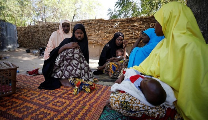 Relatives are seen during a condolence visit to the mother of one of the abducted Government Girls Science Technical College  GGSTC  Dapchi students in Jumbam Village  Yobe State  Nigeria February 24  2018  REUTERS Afolabi Sotunde