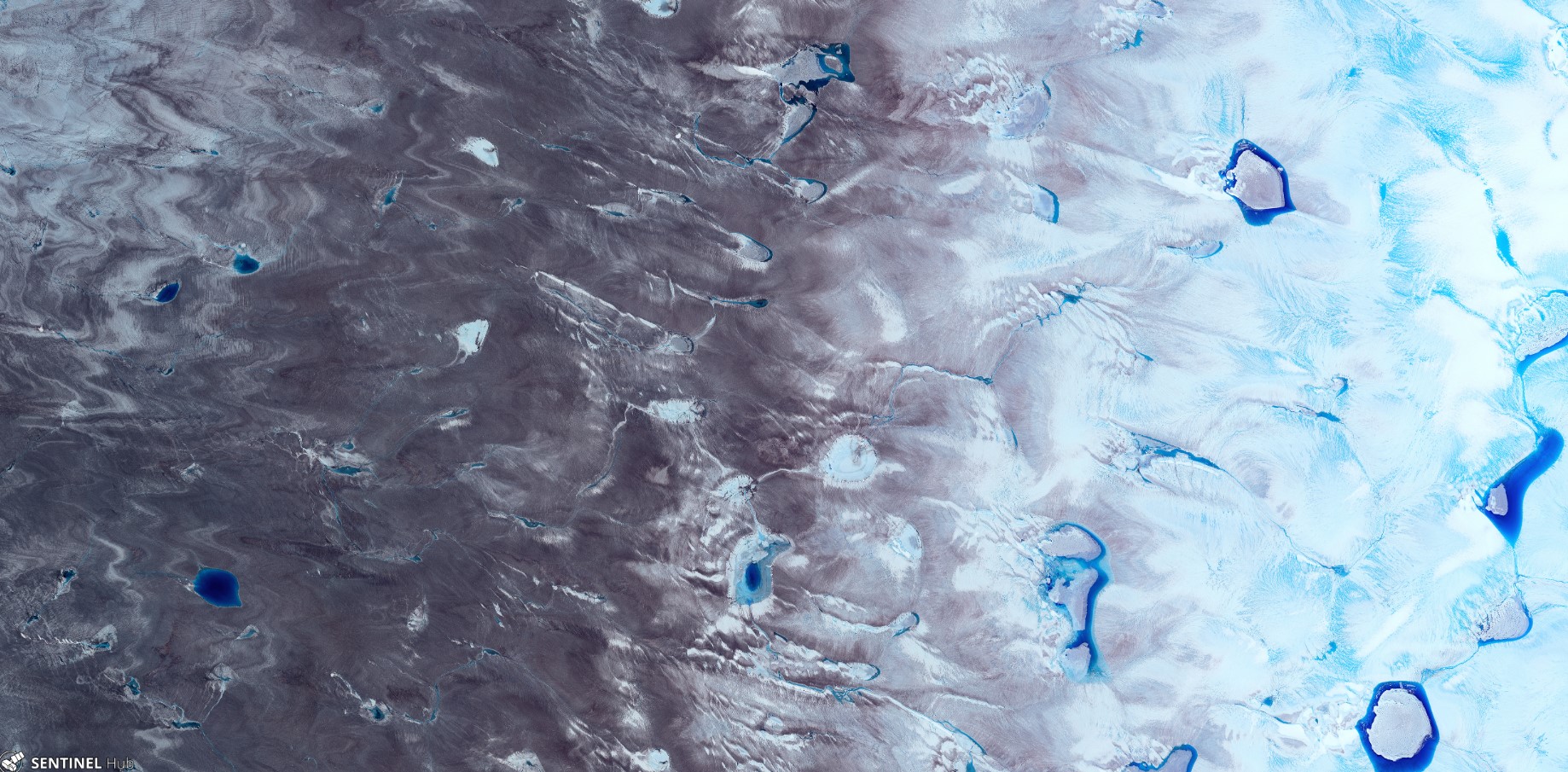 Groenlandia antes era totalmente blanco. El derretimiento masivo hace que se vea como una masa gris y marrón. 
