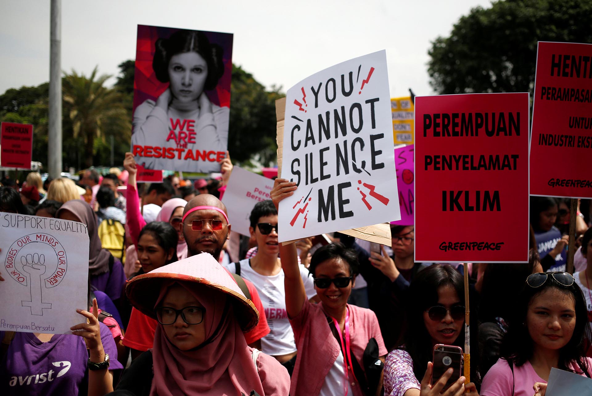 People take part in a rally calling for women's rights and equality ahead of International Women's Day in Jakarta, Indonesia, March 4, 2017. REUTERS/Darren Whiteside