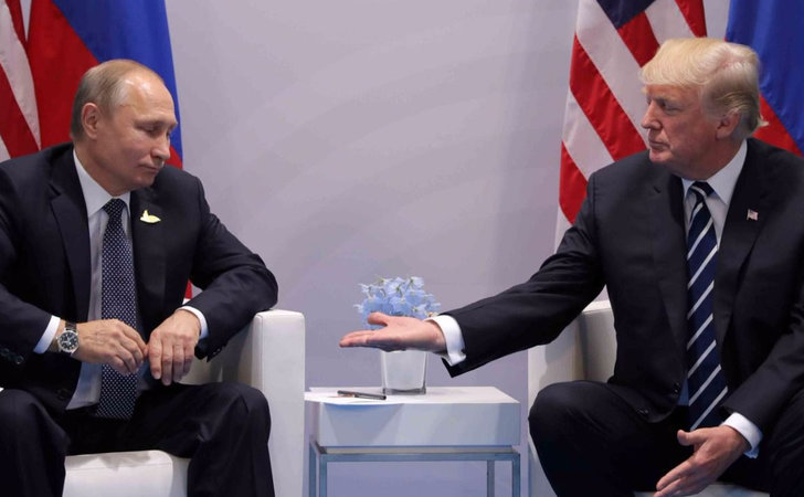 Vladimir Putin junto a Donald Trump en su primer encuentro